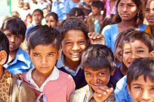 Sabbalpura, India - March 15, 2014: Group of happy indian school children posing in the rural village, Rajasthan, India.