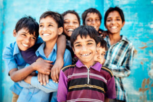 Sabalpura, Rajasthan, India: 15. March 2014: Happy smiling and laughing group of indian boys in the streets of Sabalpura, Rajasthan, India. Real People Editorial Portraits. Shot with consent of parents and family in Sabalpura with getty photographer group.